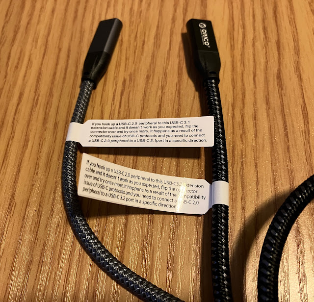 Two USB-C cables with tags