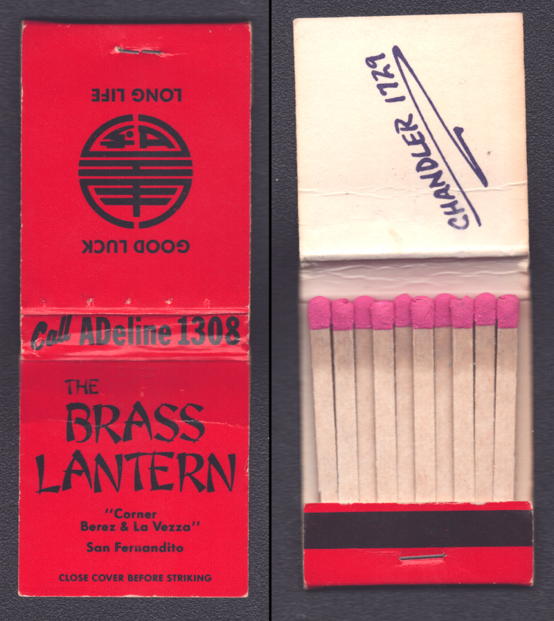 A red matchbook from a fictional restaurant called "The Brass Lantern". The phone number "ADeline 1308" is printed on the cover; another number, "CHANDLER 1729", is hand-written inside. The back says "Good luck, long life" with a circular Chinese symbol.